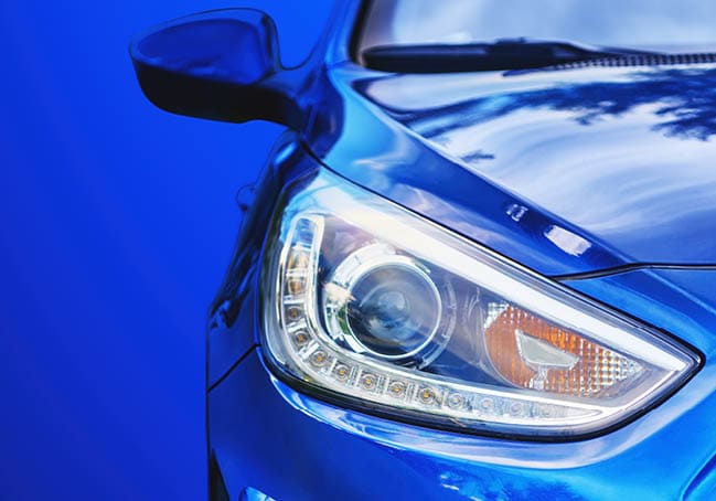 Car headlight. Lamp of modern car headlight. Close up view with copy space.