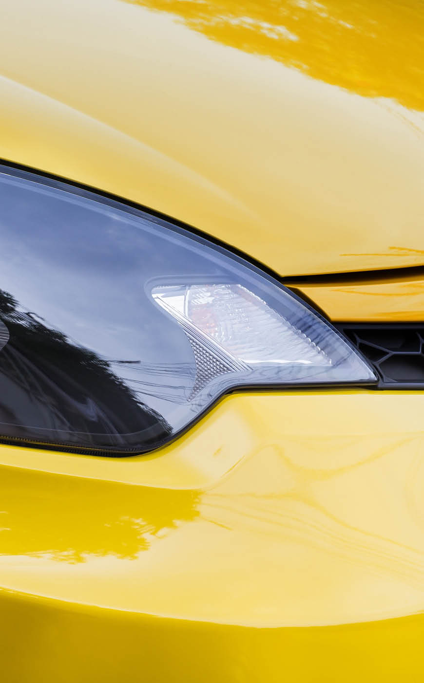 Closeup point on Headlight lamp car.